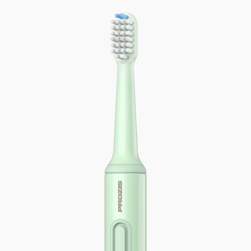 green electric toothbrush