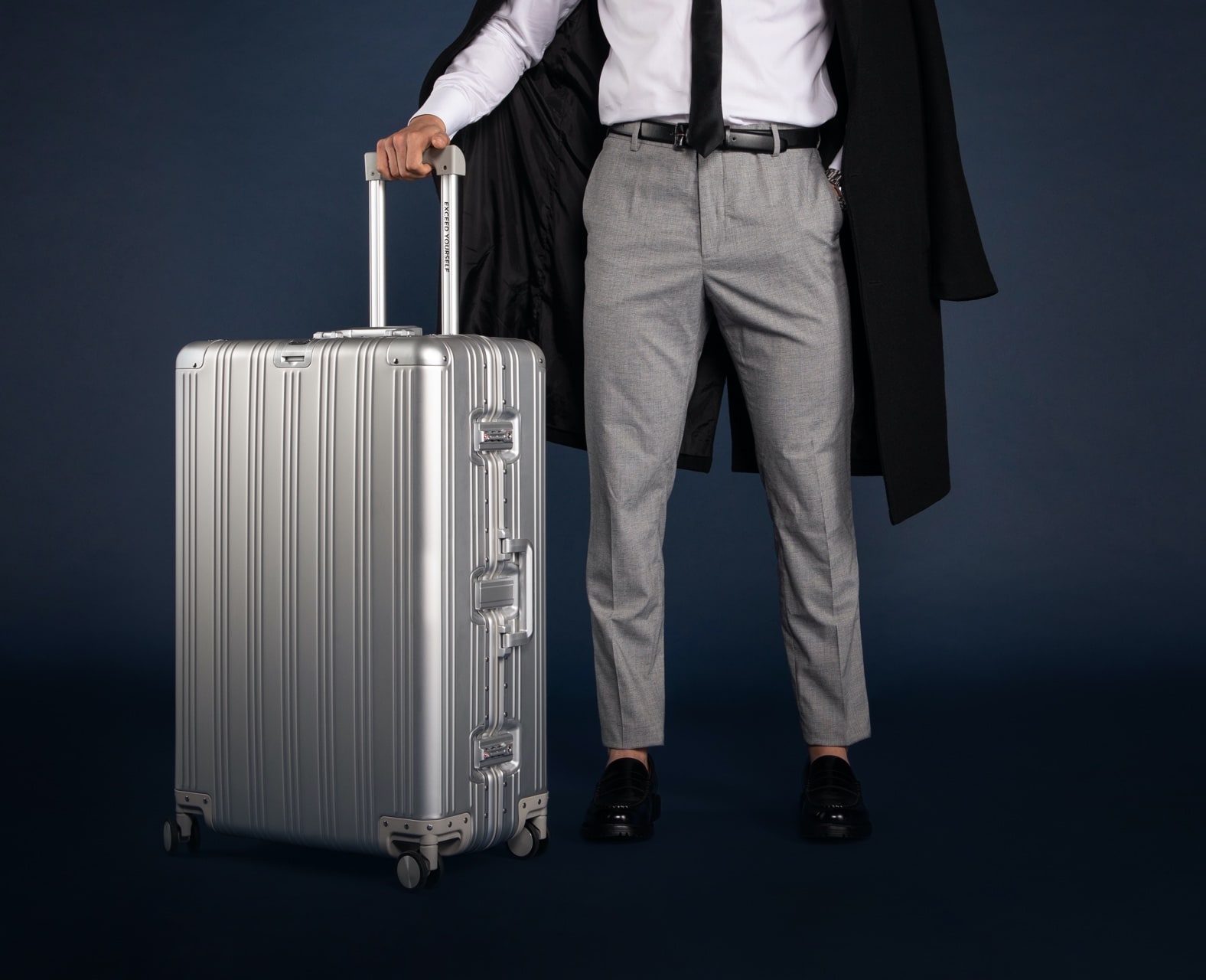 silver aluminum suitcase