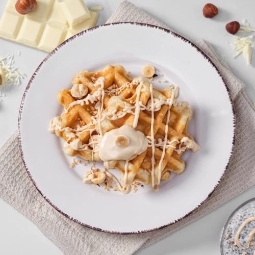 Indulgent Topping aus weißer Schokolade und Haselnuss 250 g (2)